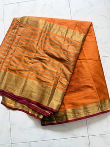 Vibrant Orange Saree with Golden Stripes