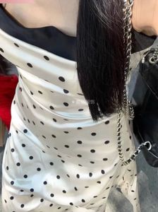 white polka dot strap midi dress