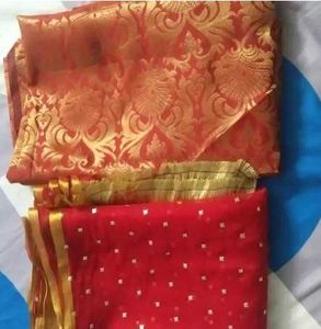 Stunning Red Saree with Gold Embellishments