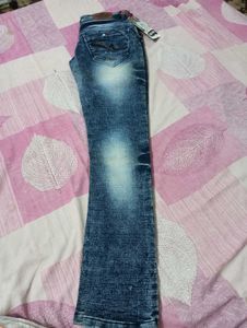 Distressed Blue Denim Jeans