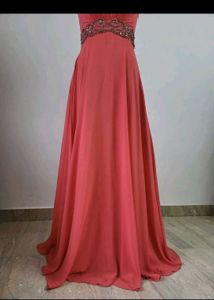 Elegant Strapless Coral Gown with Embellished Wais