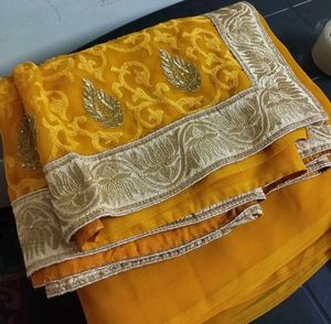 Elegant Yellow Embroidered fancy Saree