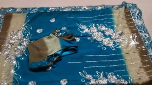 Stunning Teal Blue Saree with Silver Embellishment