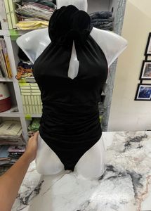 Elegant Black One-Piece Swimsuit with Floral Detai