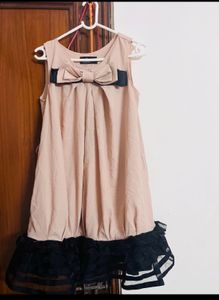 Frilled nude dress