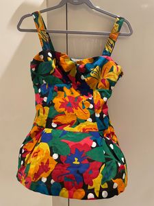 CUTE PEPLUM TOP IN S/M