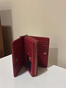 Elegant Red Wallet with Deer Emblem
