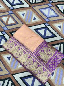 Elegant Peach Saree with Peacock Border
