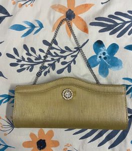 Elegant Gold Clutch with Embellishment