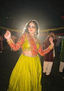 Vibrant Tiered Lehenga Skirt with Embroidered Blou