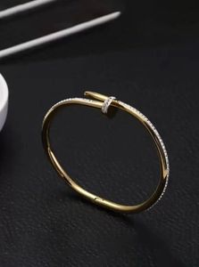 Gold Nail Bangle with Crystals
