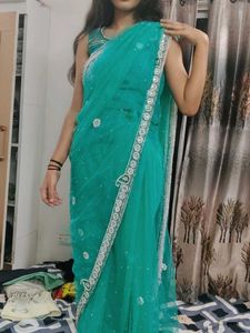 Elegant Teal Saree with Embellishments