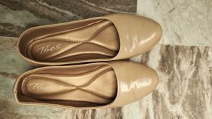 Elegant Nude Wedges