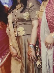 Elegant Brown Lehenga Choli with Gold Embroidery