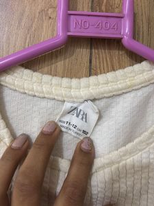 Cream Ribbed Twist Front Top