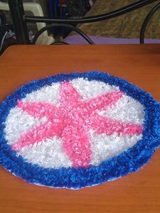beautiful woolen Rangoli mat