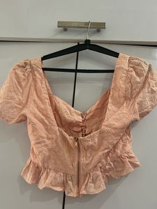 Chic Lace-Up Peplum Top