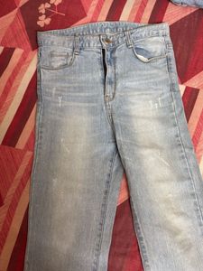 Light Wash Distressed Denim Jeans