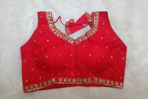 Sleeveless embroidered red blouse