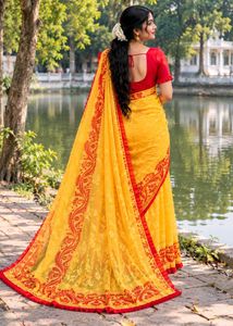 Vibrant Yellow Saree with Red Border