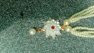 Elegant Pearl Necklace with Floral Pendant