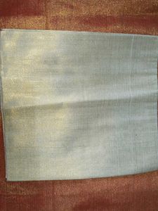 Shimmering blouse material.