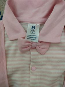 BKIDS small size boy's dress look like romper in pink and white color combination.