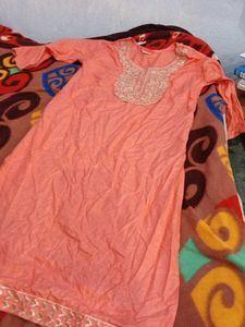 Elegant Peach Kurta with Embellished Neckline