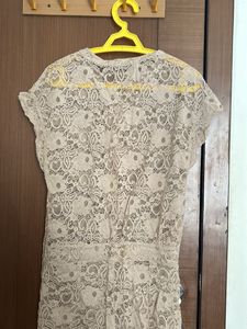 Net Jumpsuit With Bottons In Front To Open