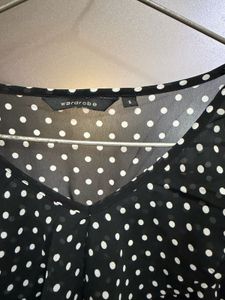 Chic Black Polka Dot Ruffle Top