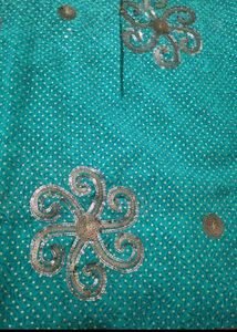 Beautiful Teal Saree with Silver Embellishments