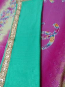 Elegant Teal Saree with Gold Border