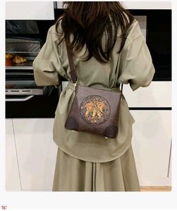 Embossed Elephant Bucket SlinG/Bag