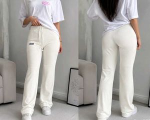 Cream Corduroy Flare Pants For Women