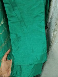 Elegant Green Saree with Gold Floral Print