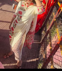 worn only once. Beautiful Floral Kurta Set urge