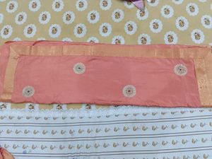 Elegant Peach Saree with Intricate Embellishments