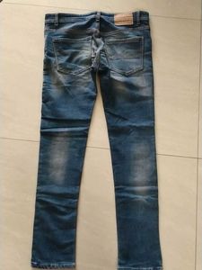 Distressed Patchwork Denim Jeans
