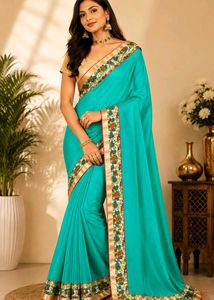 Stunning Teal Saree with Floral Border