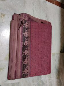 Elegant Red Saree with Intricate Border