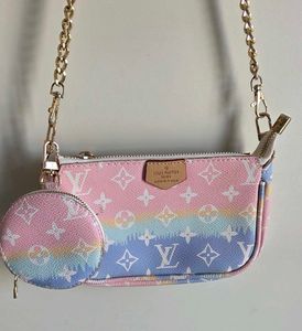 Used Louis Vuitton inspired bag with a coin purse