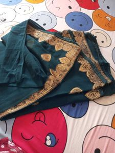 Beautiful Teal Saree with Gold Border