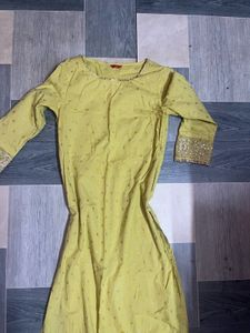 Yellow Kurta with White Pants