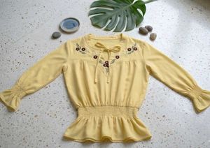 Embroidered light yellow top