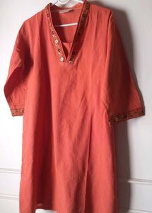 Unused Rust short embroidered Kurti.