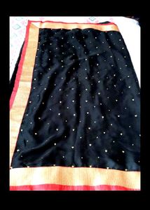 Elegant Black Saree with Gold Border