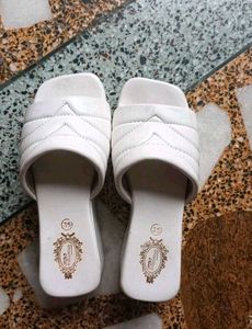 White platform heels