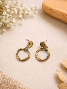 Vintage-inspired gold hoop earrings