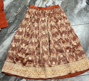 Orange Embroidered Kurta and skirt