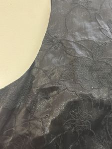 Shiny reflecting black dress